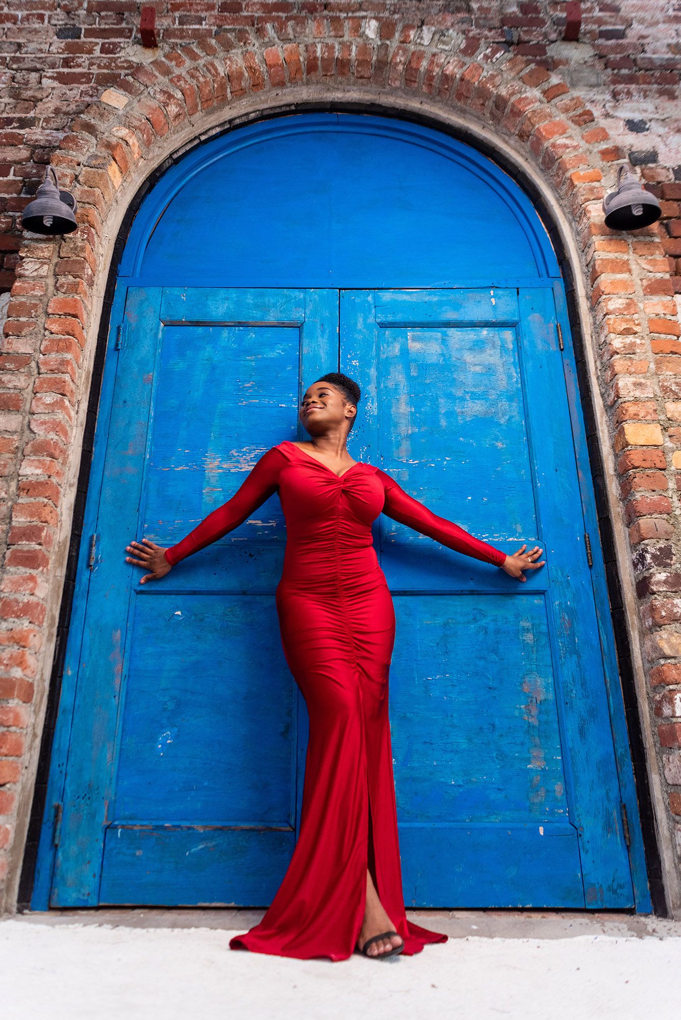 Blue door portrait in Port Royal, Kingston, Jamaica, by Christopher James of Cjam Photos