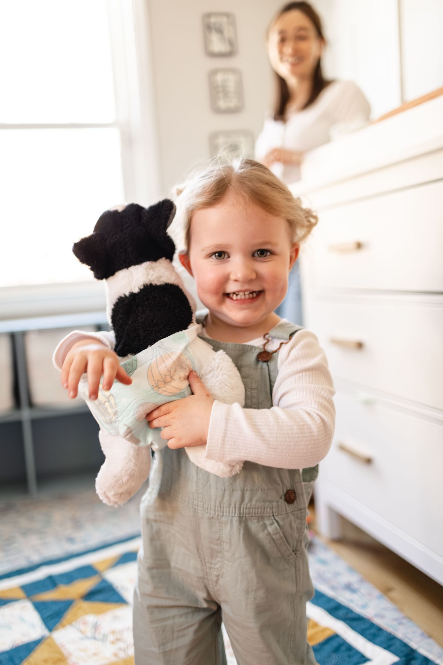 Smiling toddler during in-home family photo session in Minneapolis