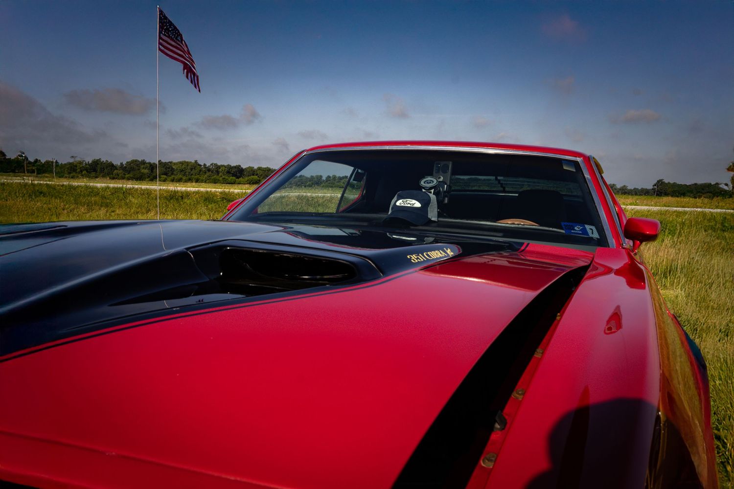 American muscle hot rod mustang with American flag and Ford hat