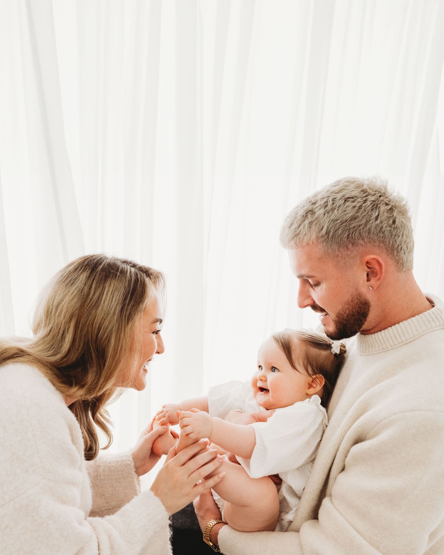 this beautiful, timeless family portrait was captured naturally by positioning the family and allowing their own magic to unfold