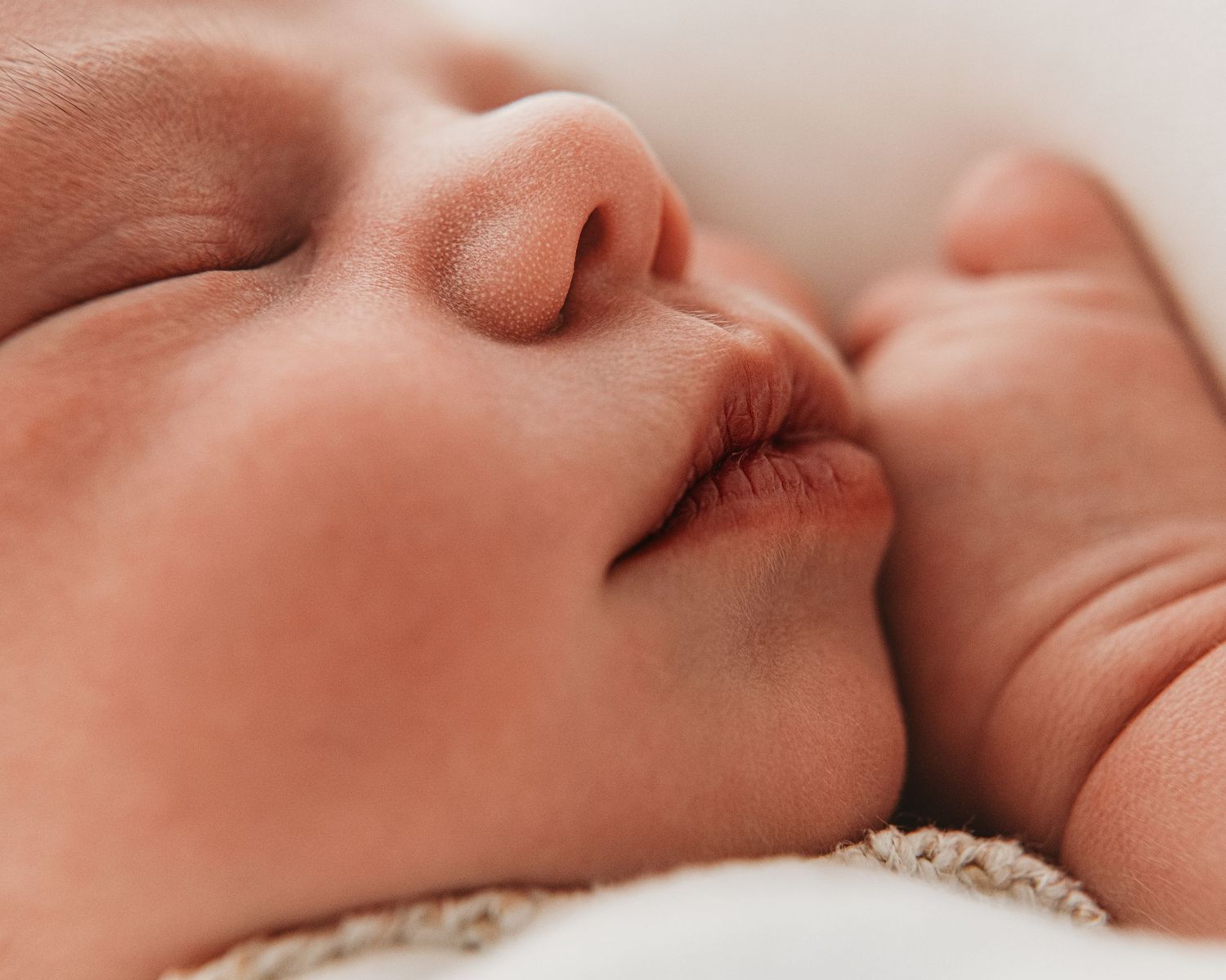 Close up of sleeping newborn baby, every little detail captured in Ayrshire to allow new parents to remember their baby perfectly