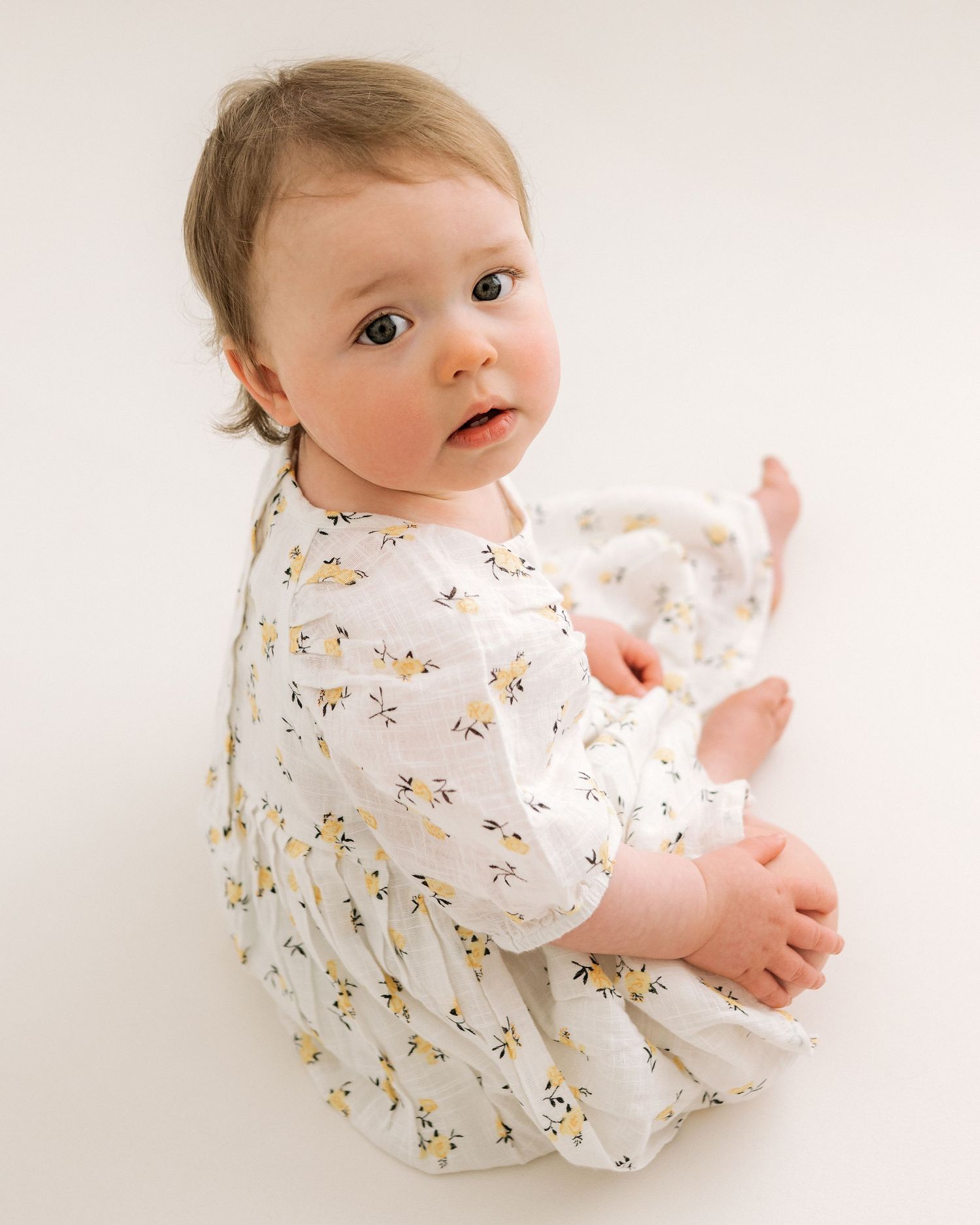 Timeless studio milestone portrait of baby at one year old by Ayrshire family photographer