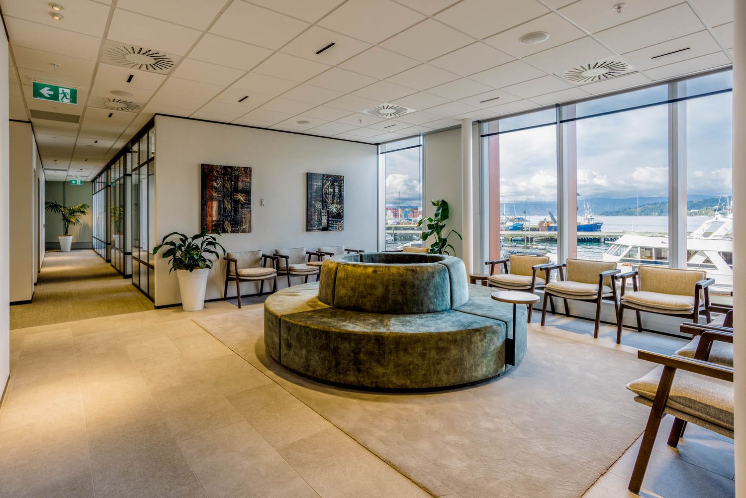 Panoramic view inside the Eye Institute Wellington with large windows and natural lighting.