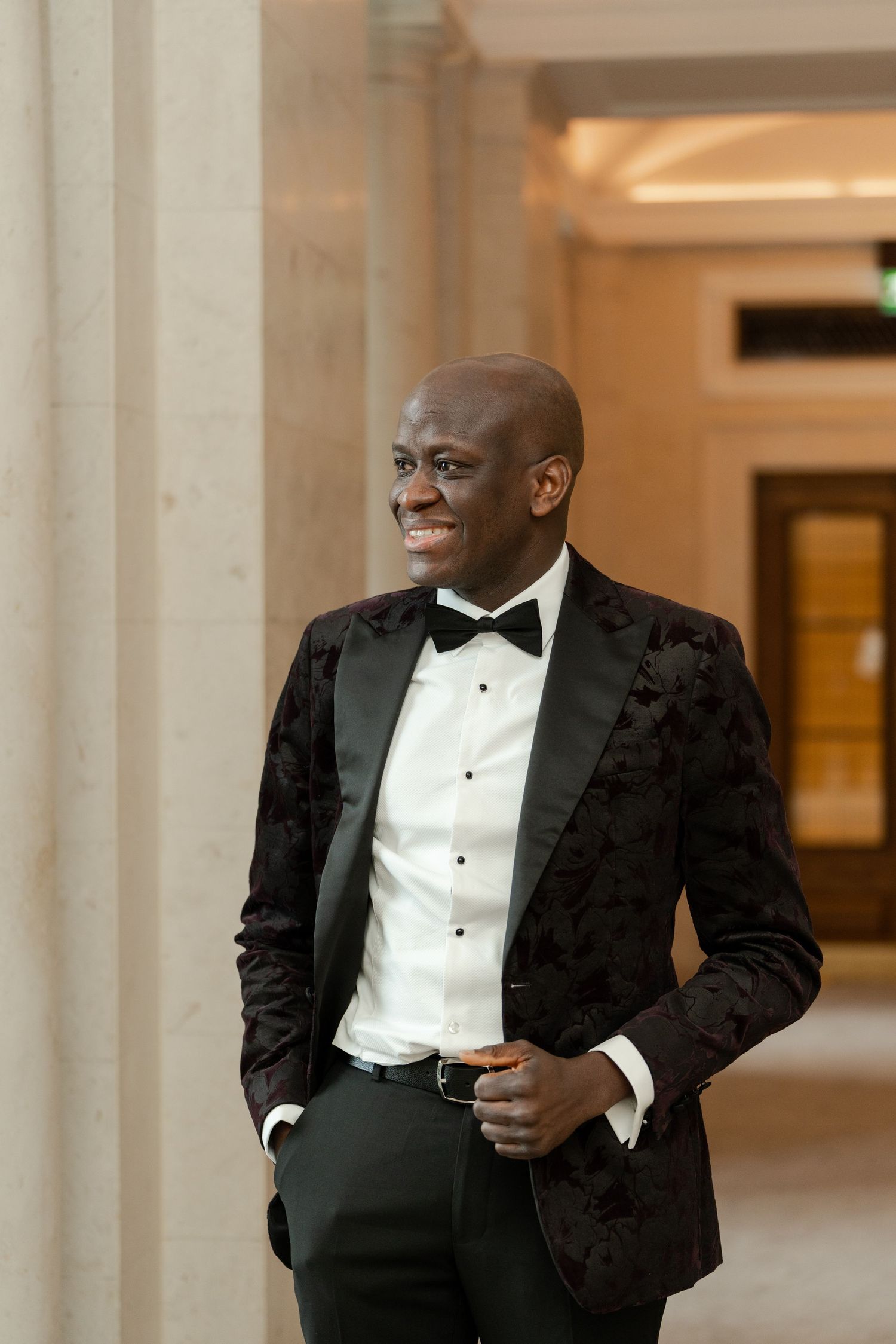 A portrait of a black man smiling
