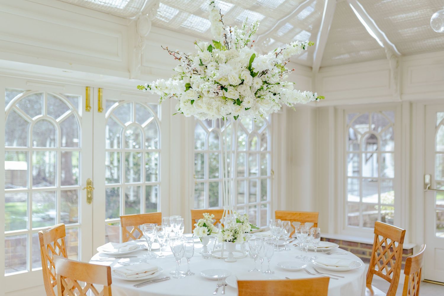 A table with a floral centerpiece
