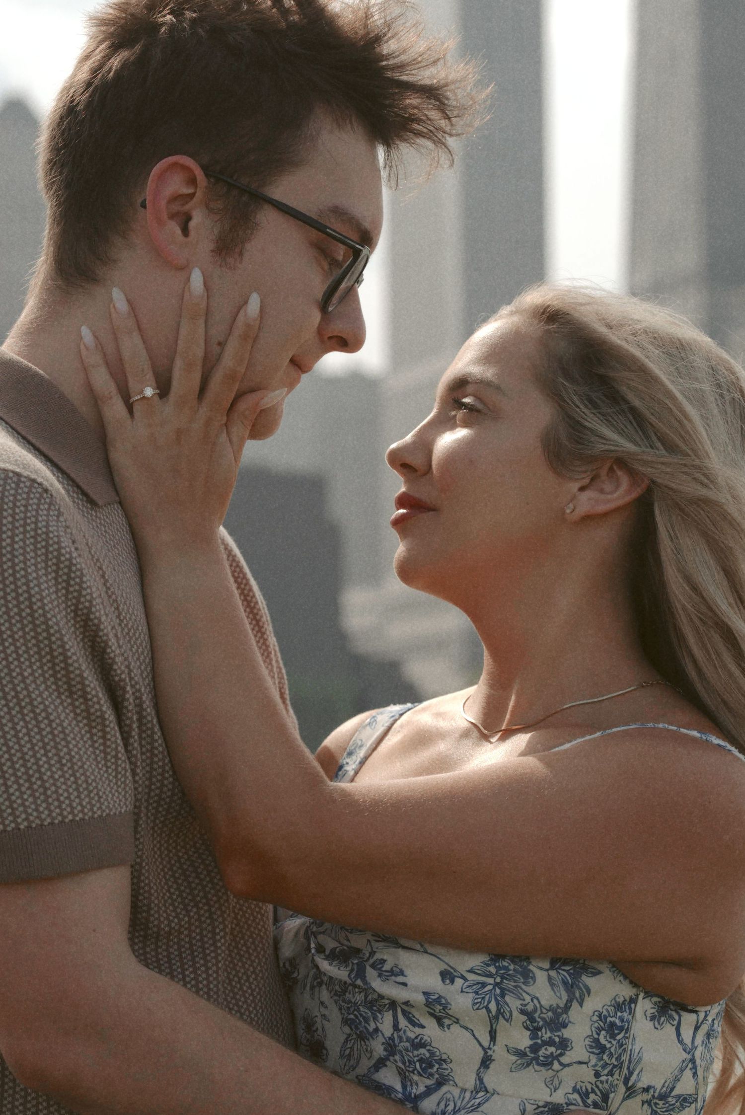 A romantic couple embraces in a series of intimate portrait shots showing their closeness and affection.
