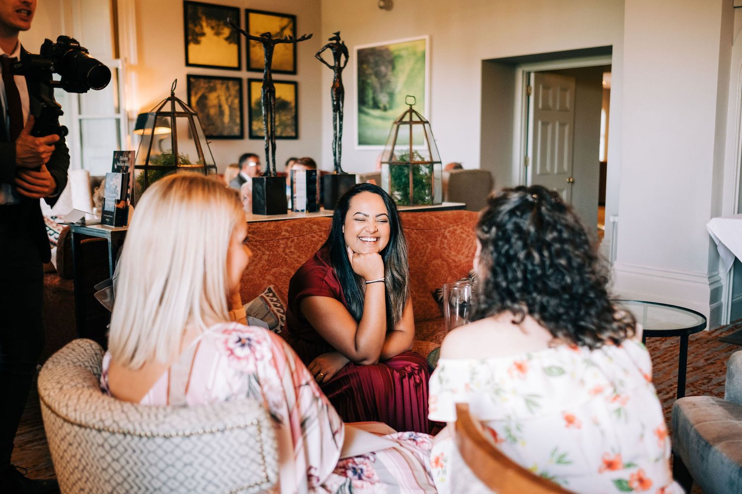Intimate indoor wedding preparation moments captured in warm lighting.
