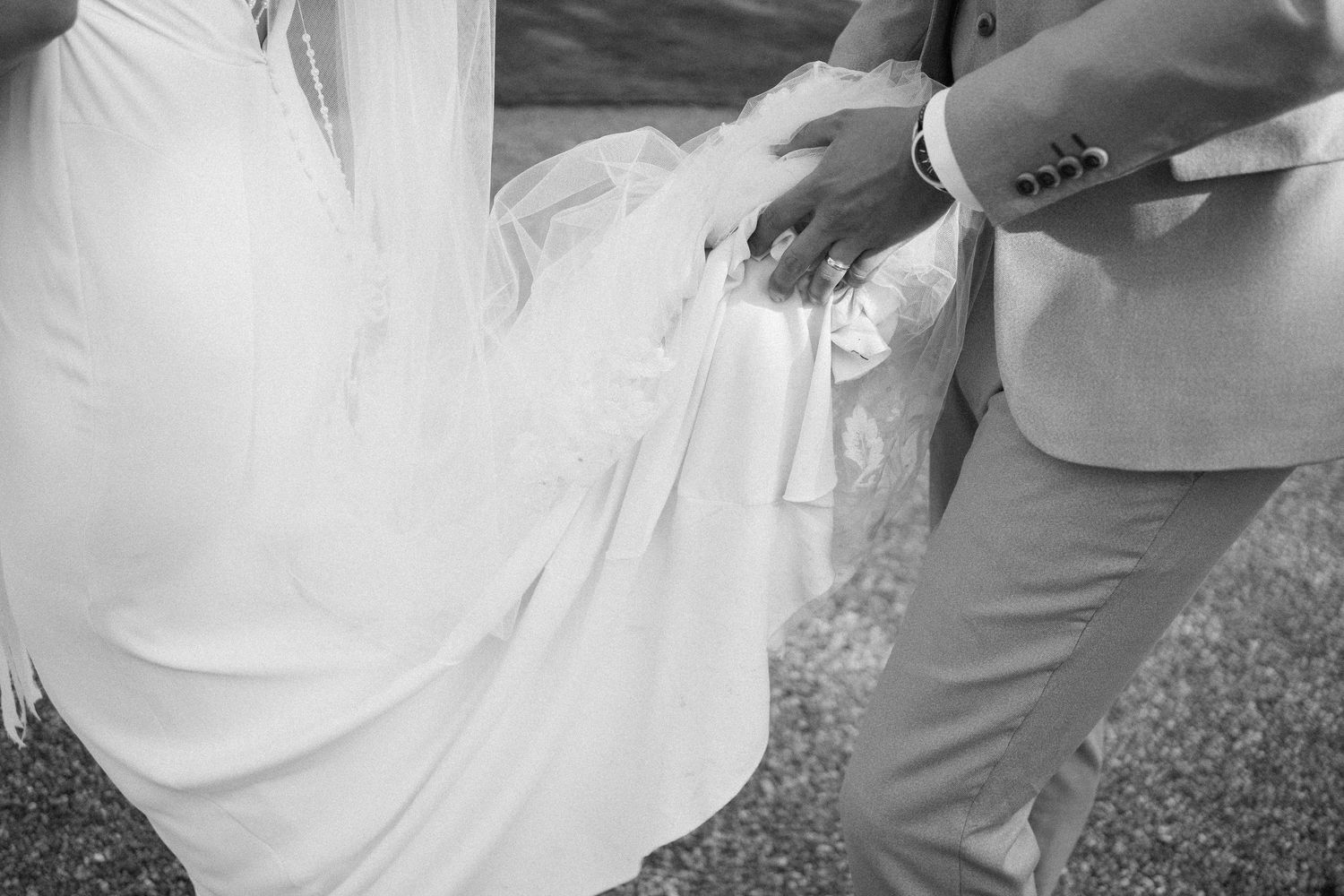 Black and white wedding portraits captured in natural outdoor setting.