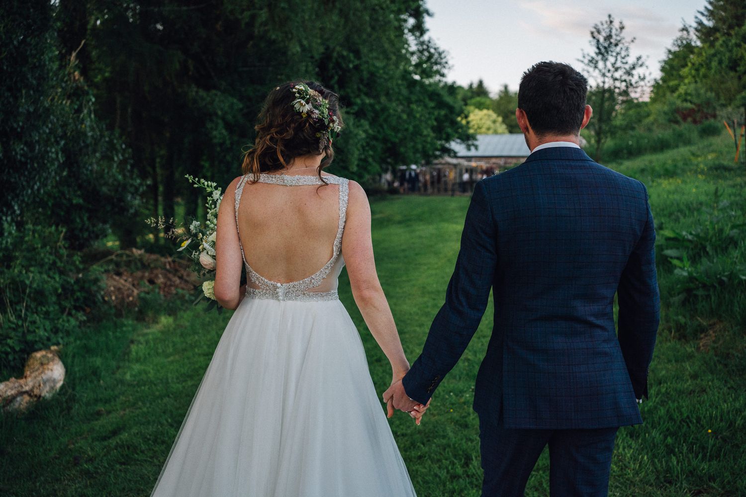 Wedding photography session in a scenic outdoor garden setting.