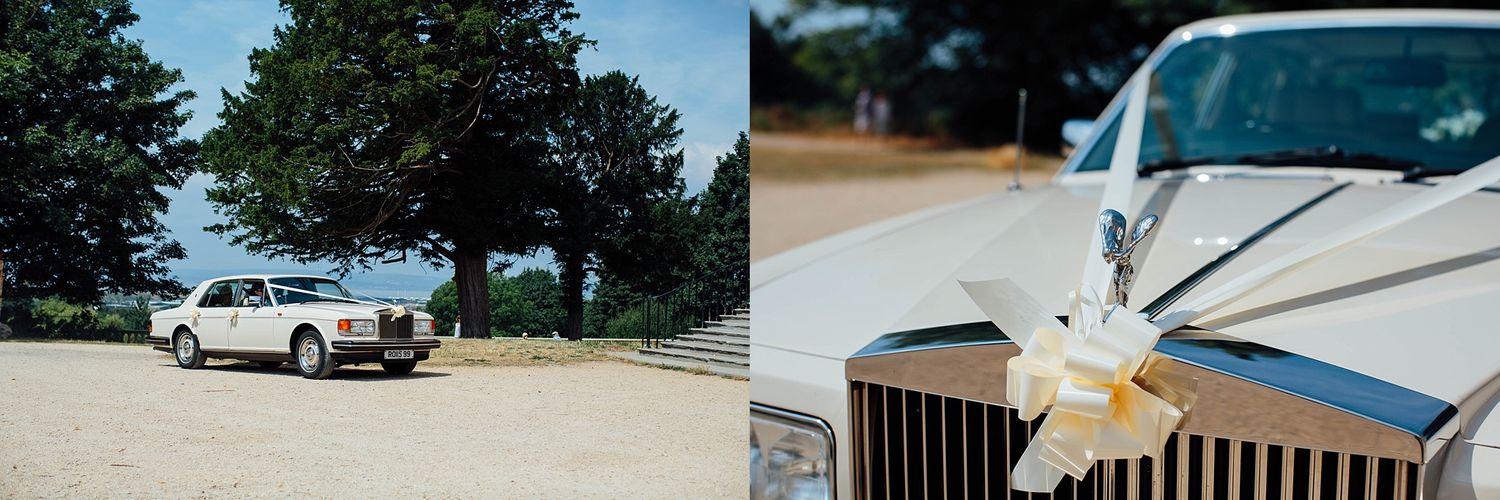 Classic cars parked outside venue create vintage atmosphere at outdoor wedding.