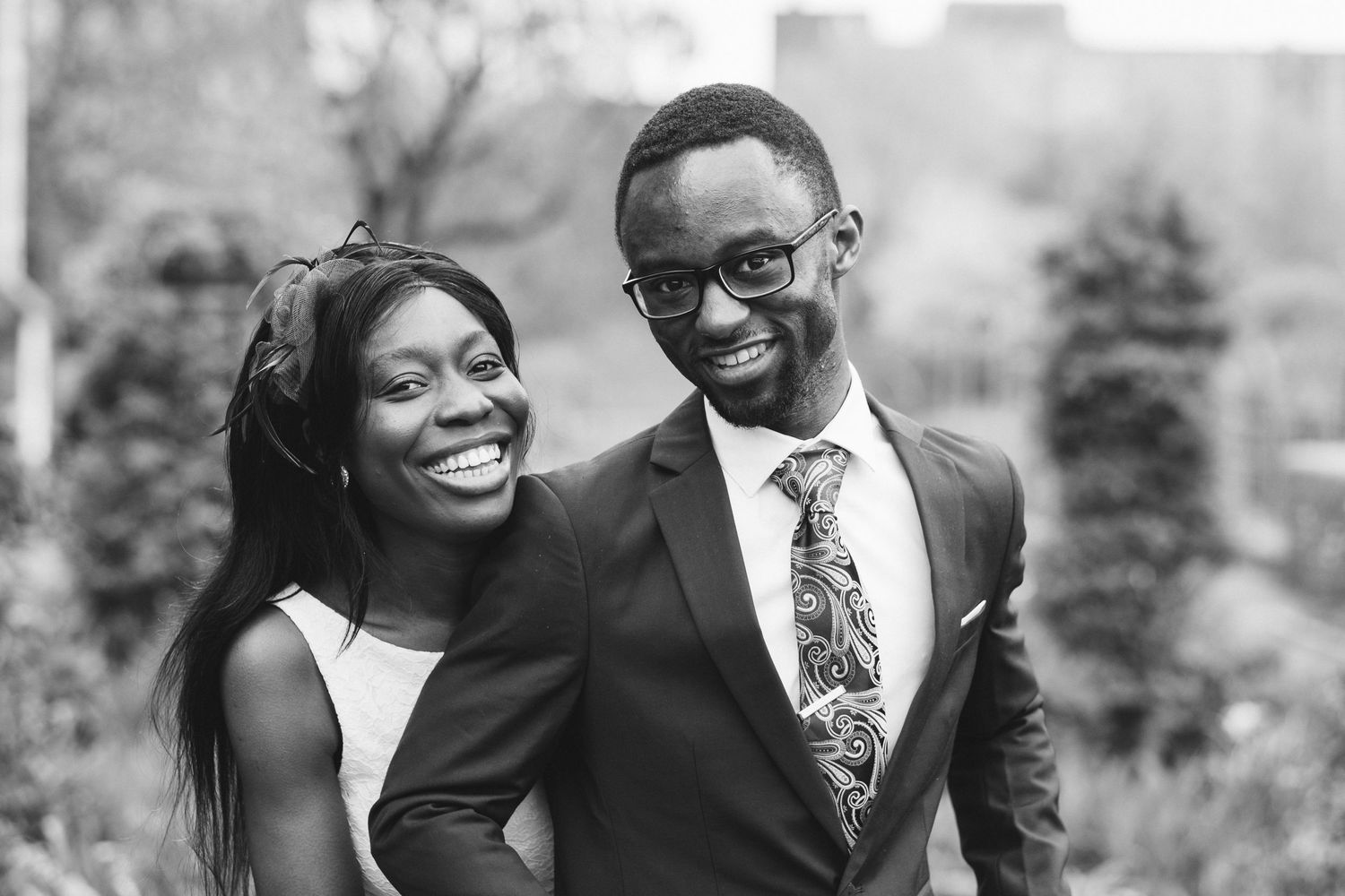 A couple shares joyful moments together during a photo session.