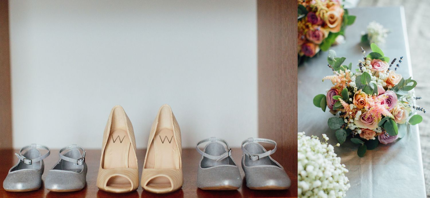 Wedding details including floral arrangements, shoes, and accessories laid out in a row.