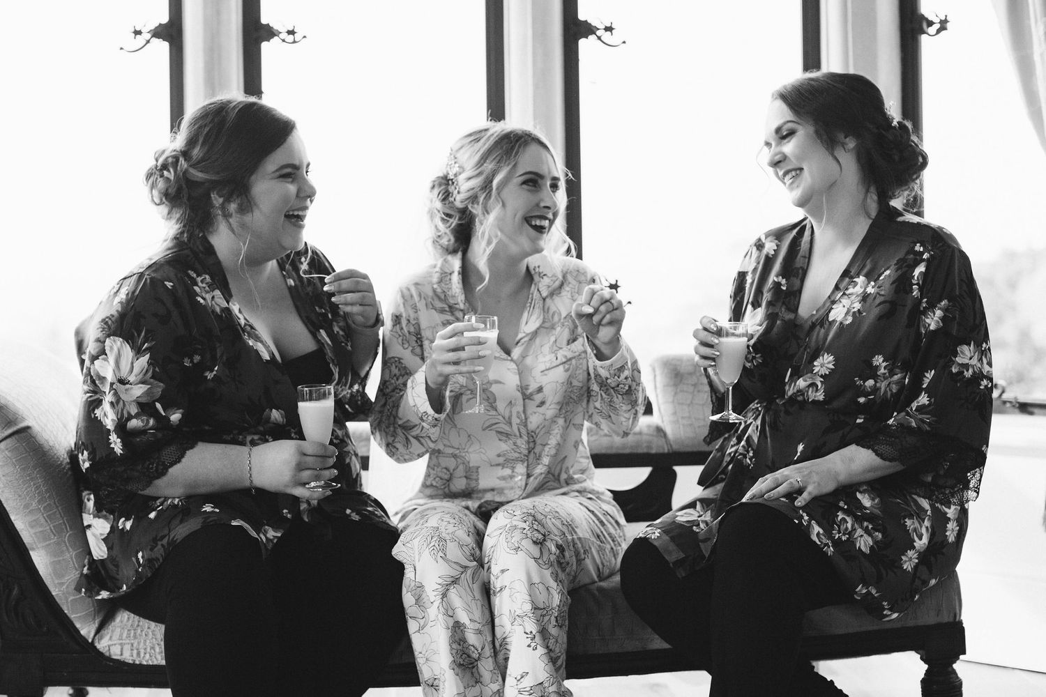Candid moments of wedding party relaxing and chatting before the ceremony.
