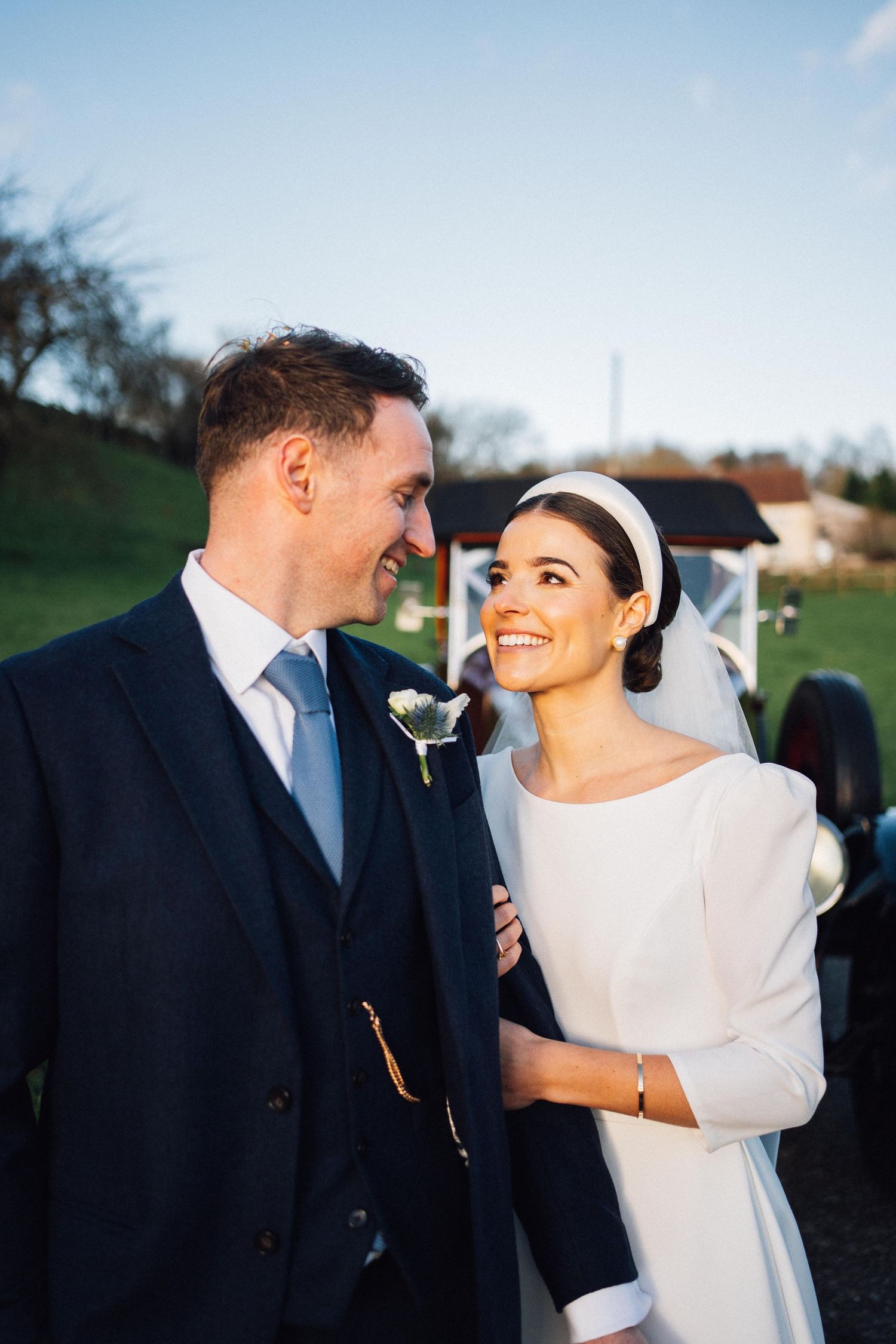 Romantic wedding couple shares intimate moments in a series of black and white outdoor portraits.