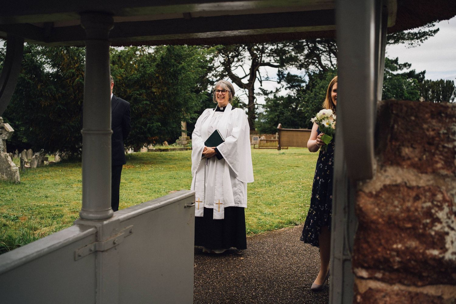 Covered walkway leading to church entrance on wedding day.