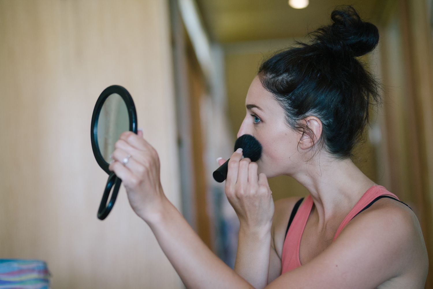 Getting ready moments captured in natural morning light.