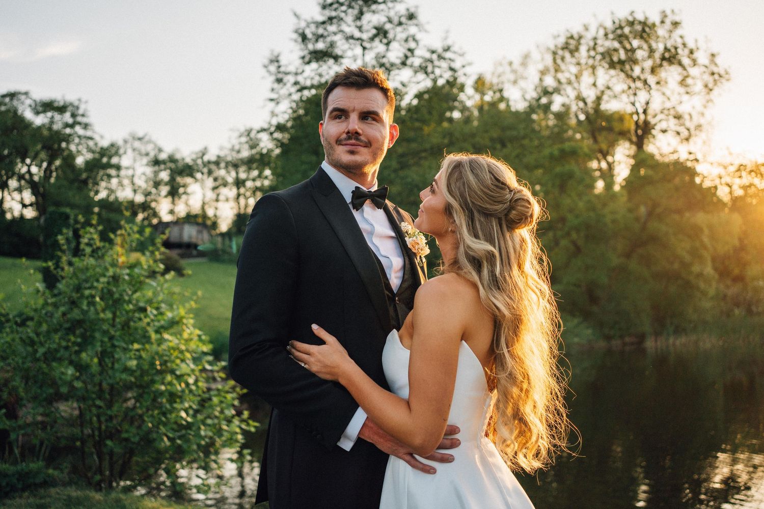 Romantic sunset portraits captured in a garden setting during golden hour.