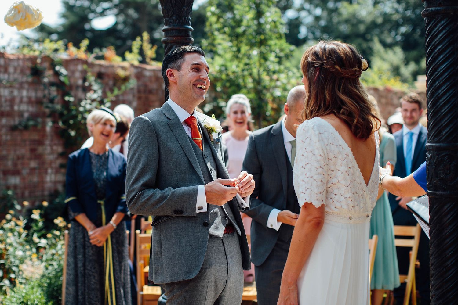 Emotional moments captured during an outdoor summer wedding ceremony.