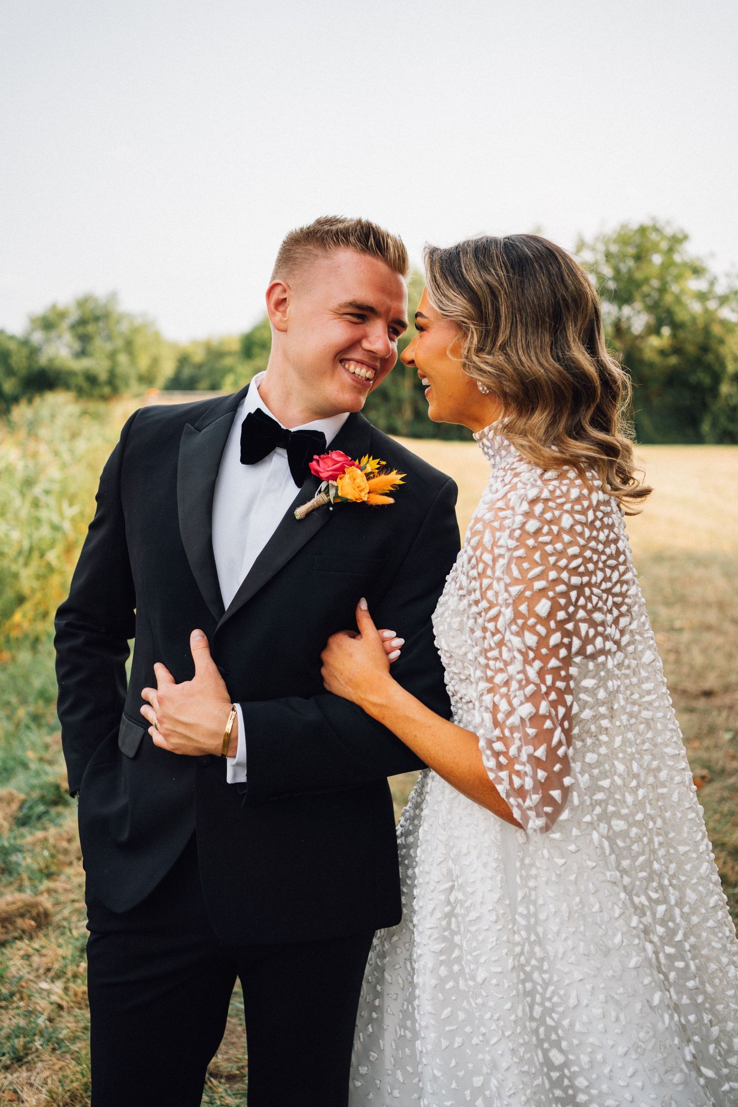 Couple holding each other at a marquee wedding in Somerset