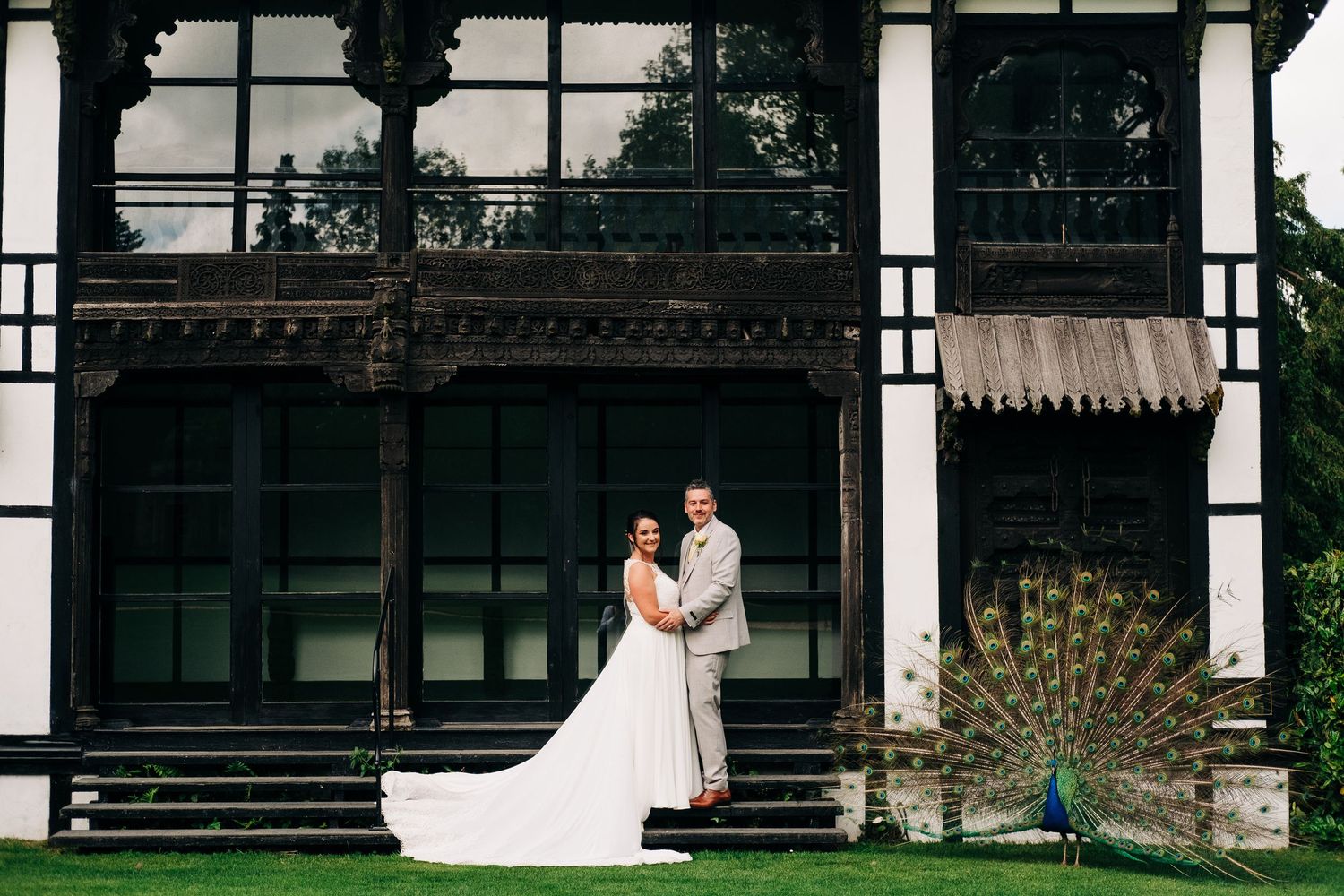 Wedding venue exterior featuring architectural details and landscaping.