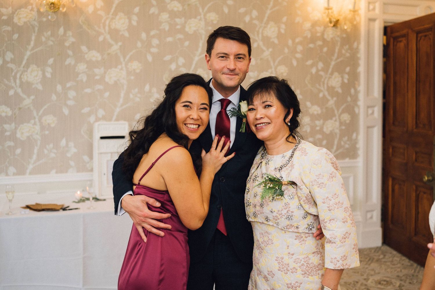 Wedding celebration candid moments captured in an elegant indoor venue.