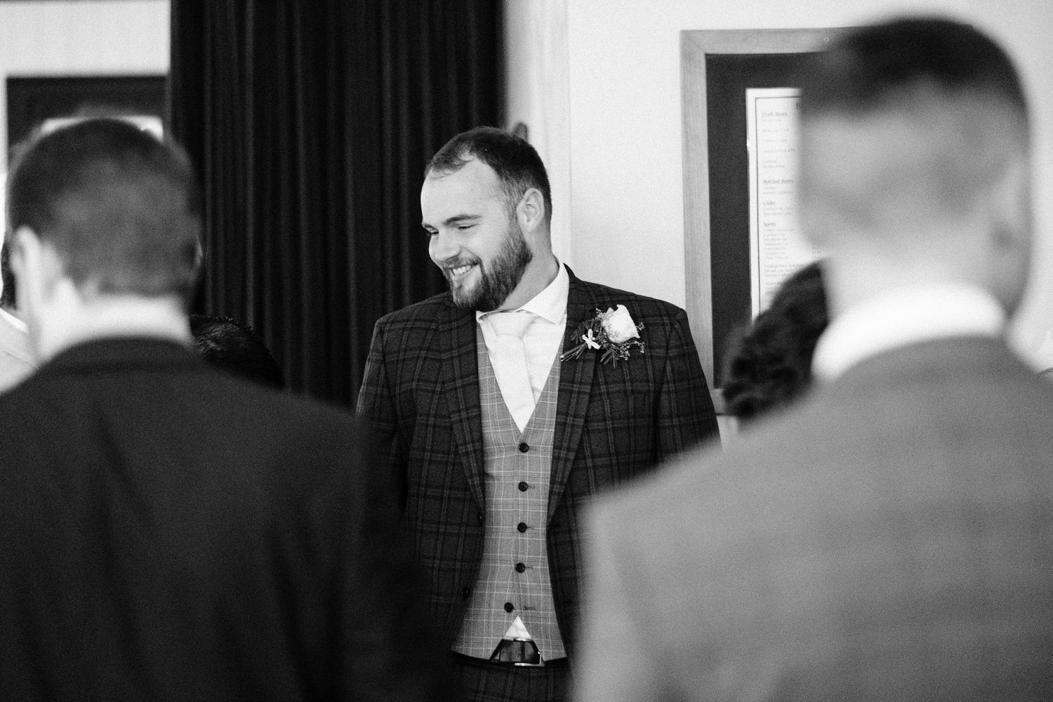 Formal attire and preparations at an elegant wedding celebration.