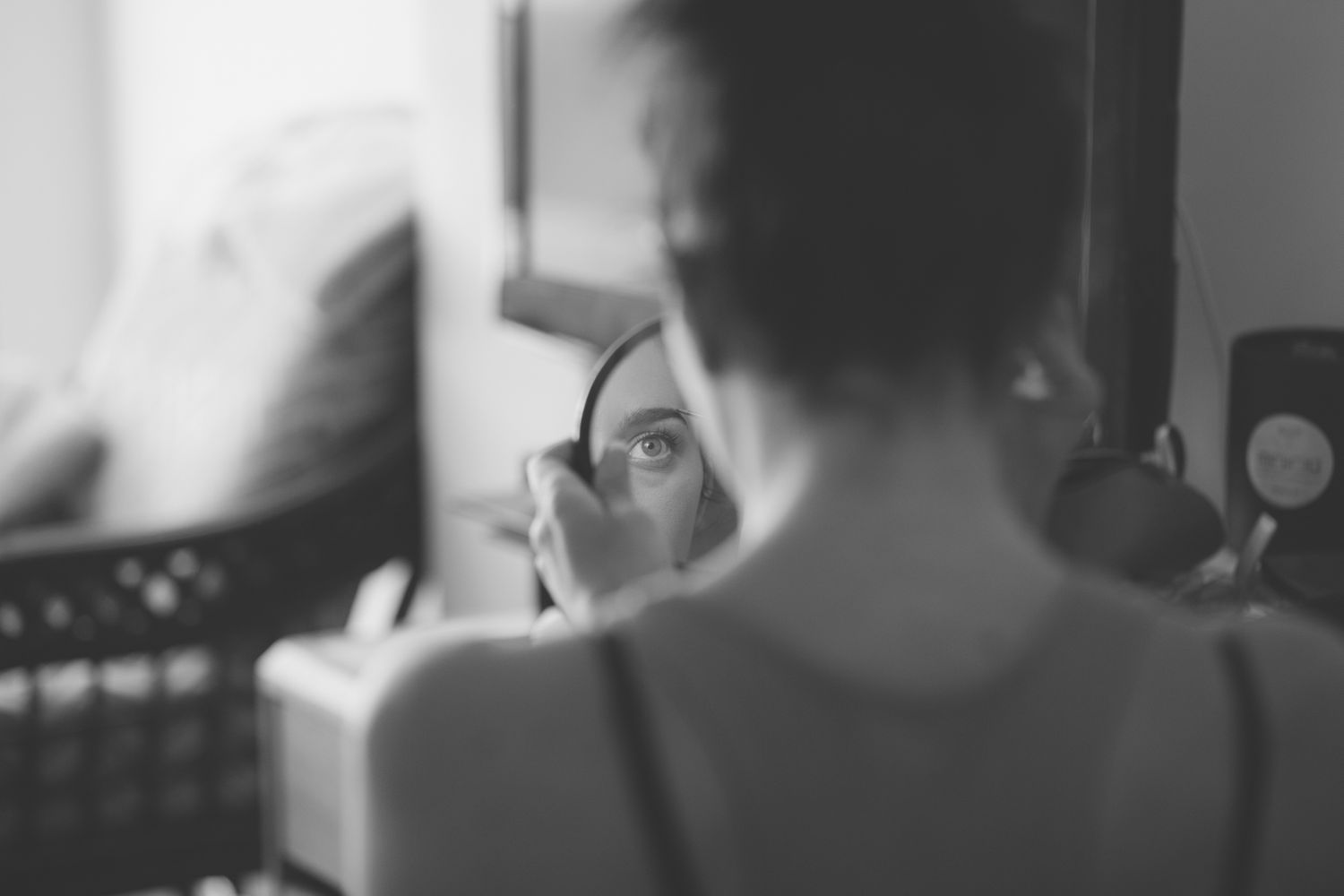 Black and white candid reception moments in soft focus.