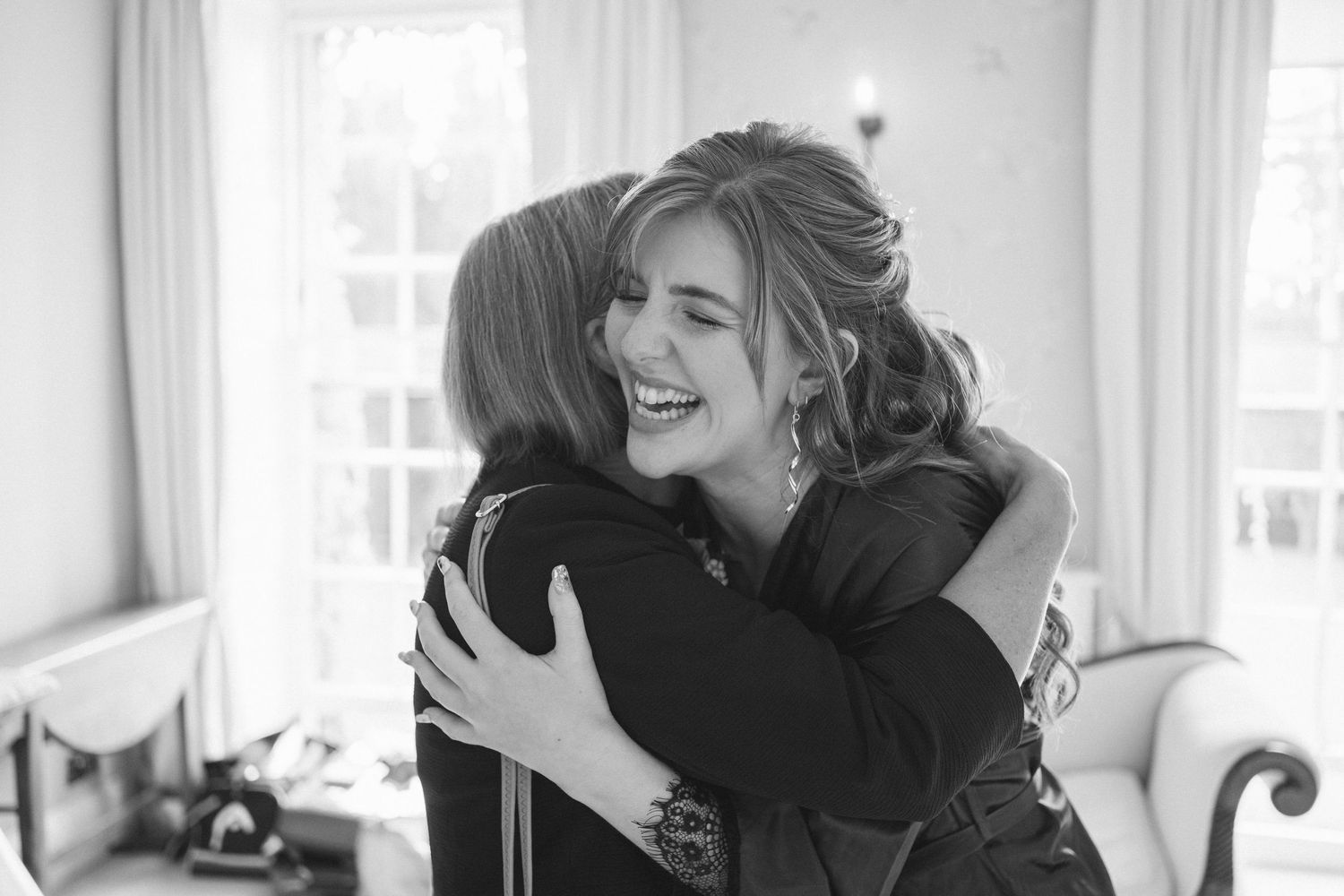 Emotional black and white sequence of wedding day embraces and celebrations.