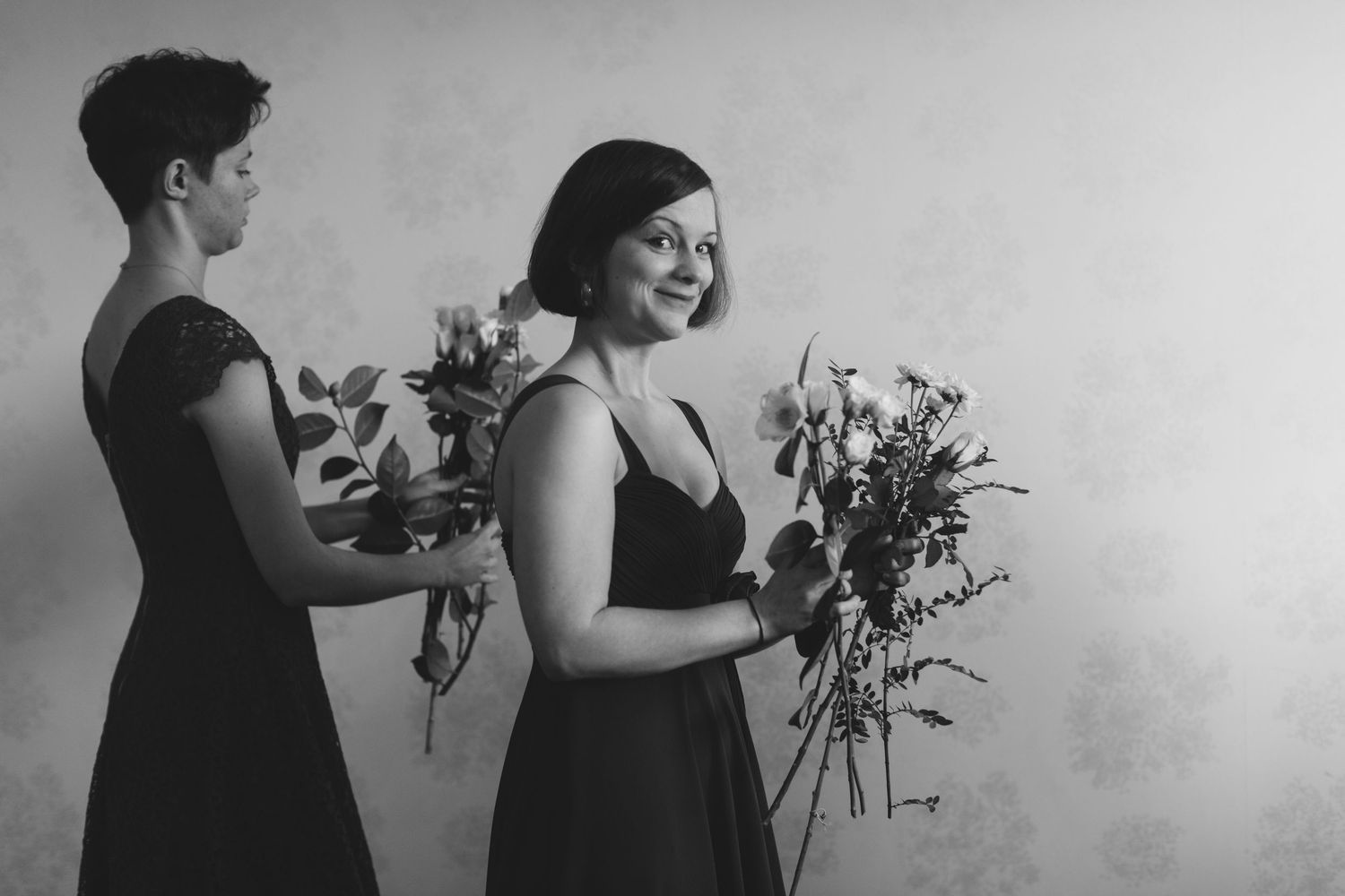 Black and white portraits capturing natural interactions between people.
