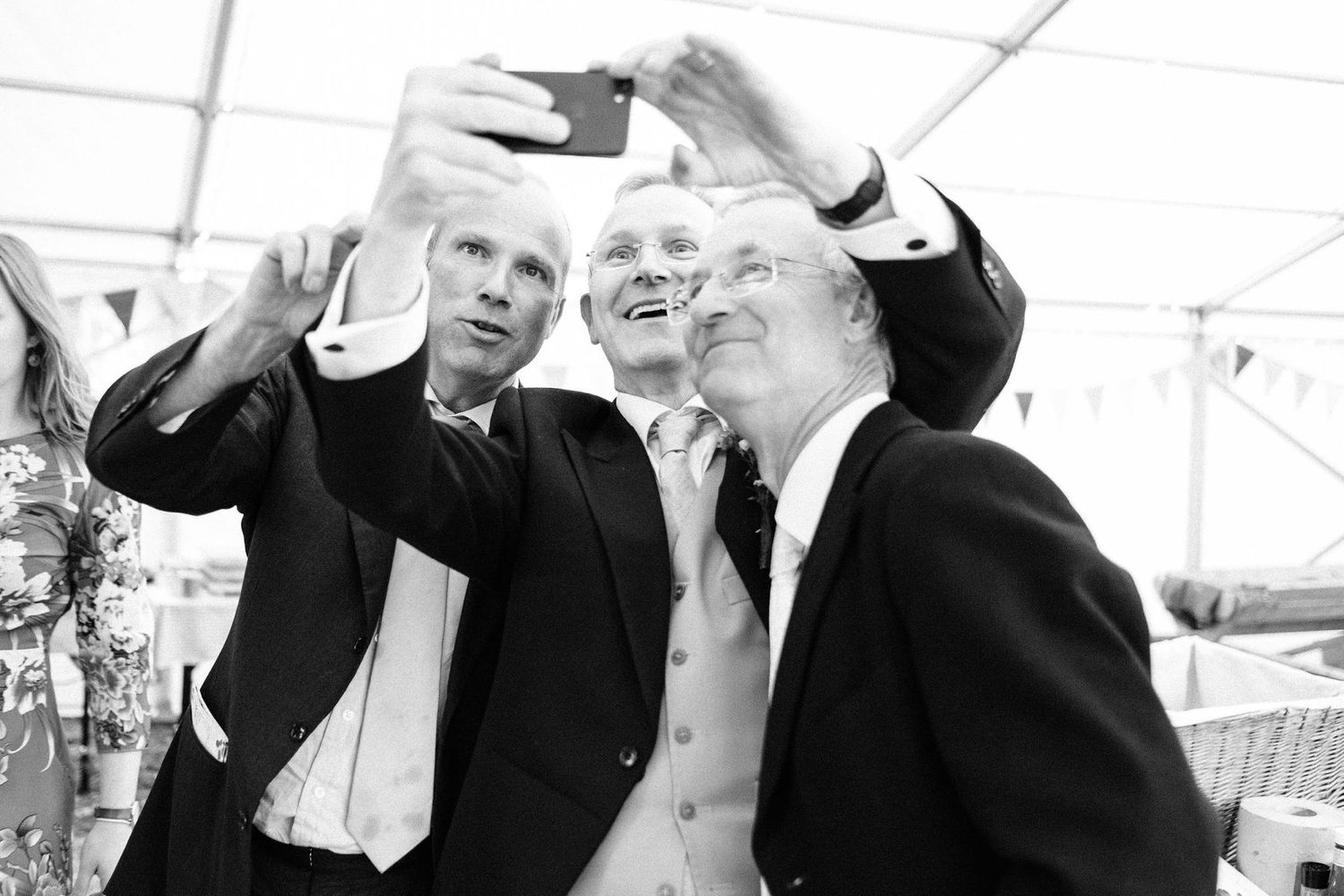 Reception attendees raise their glasses in a celebratory toast.