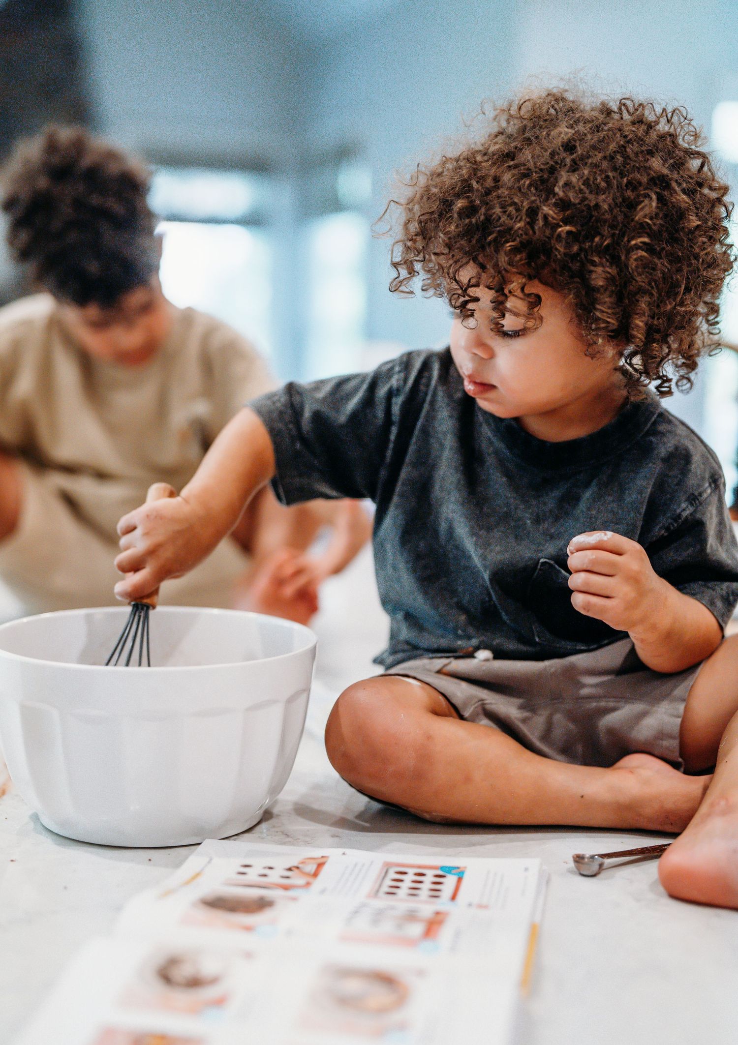 A set of photos showing someone eating and doing activities at a white table surface against a light blue background.