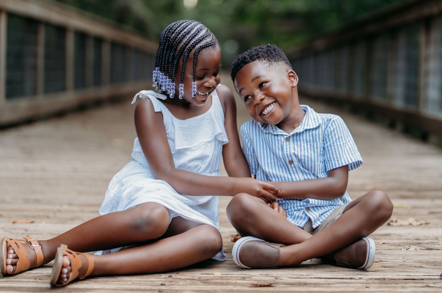 A series of candid lifestyle photos showing joyful moments and laughter while sitting on wooden decking outdoors.