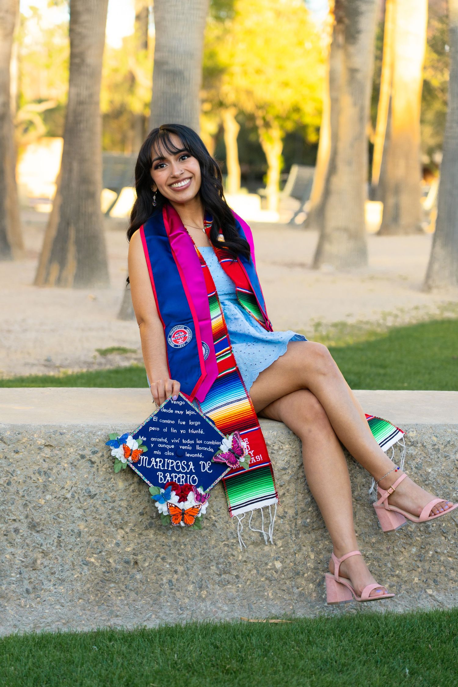 Colorful graduation photos with Mexican serape blanket at the University of Arizona.