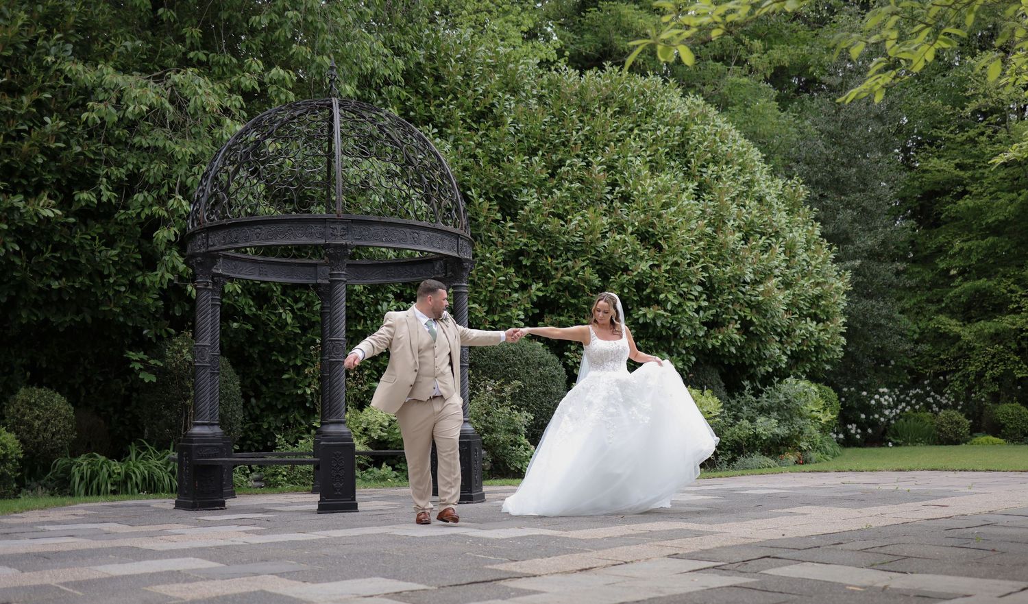 bridal couple outside Statham Lodge, Cheshire. Ruby Salmon Photography