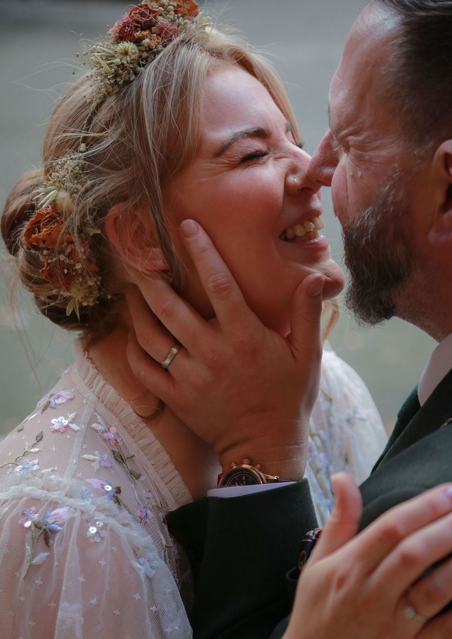 Newlyweds kissing outside Crewe Registry office, Cheshire wedding photographer Ruby Salmon Photography