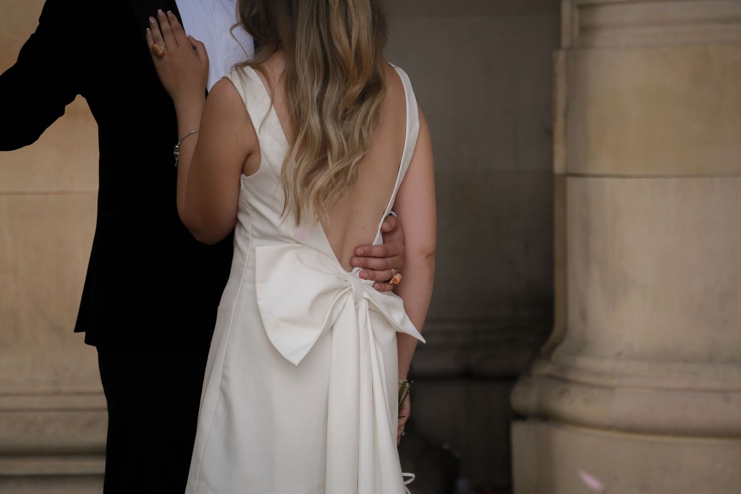 Newlyweds in a tender embrace. St George' Hall, Liverpool. Wedding photographer Ruby Salmon Photography