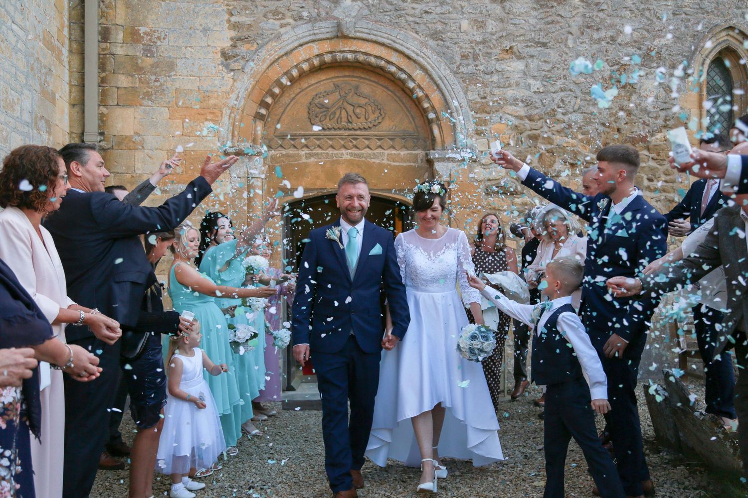 Confetti moment at a micro village wedding