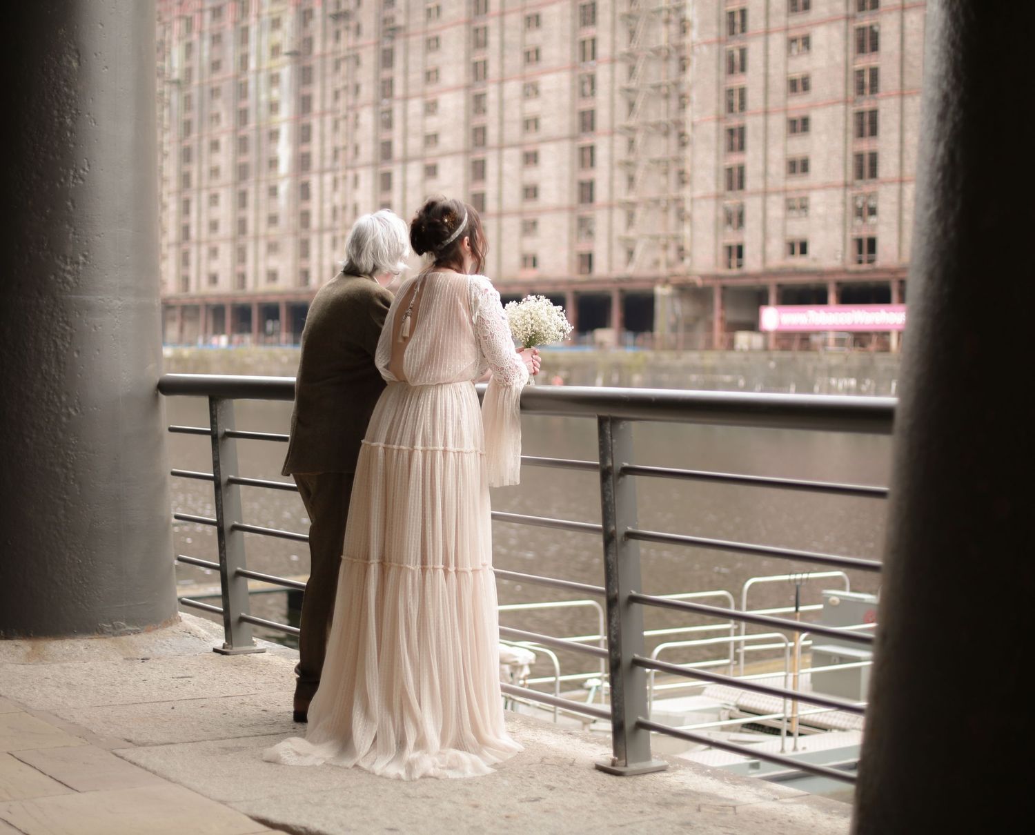 Bridal couple outside Titanic Hotel Liverpool wedding photographer, Ruby Salmon Photography.