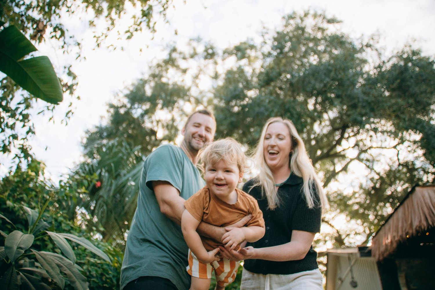 Sweet outdoor family photography session with natural expressions.