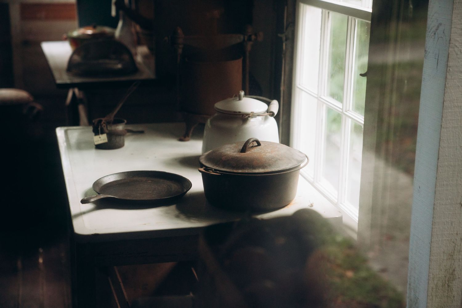 Interior shots of a historic home with natural light streaming through windows.