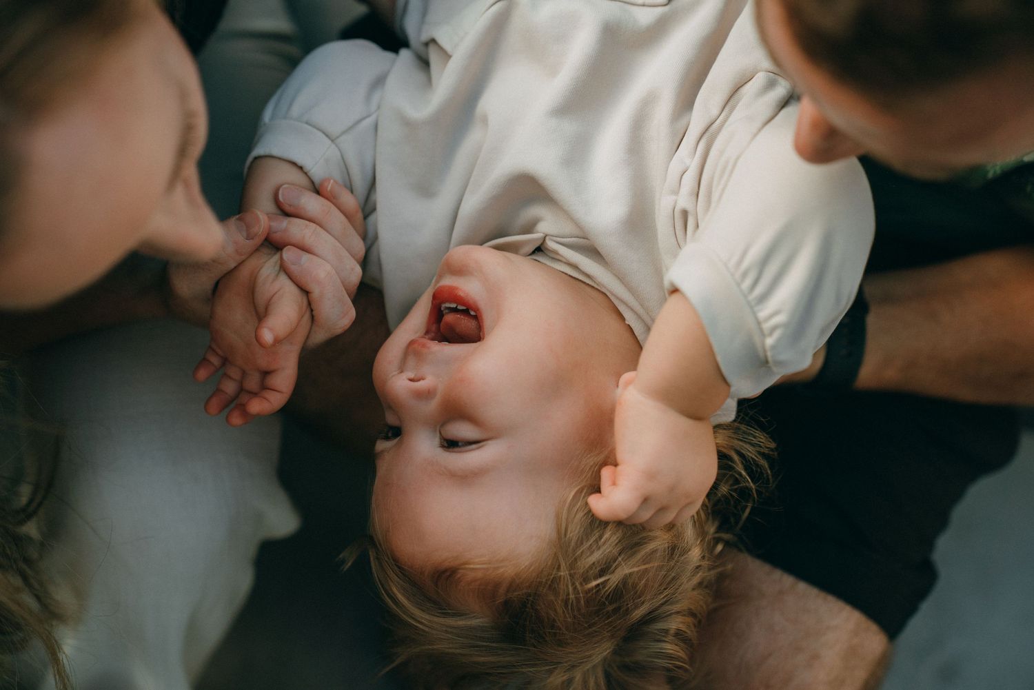 Candid close-up shots of family members sharing intimate moments together.