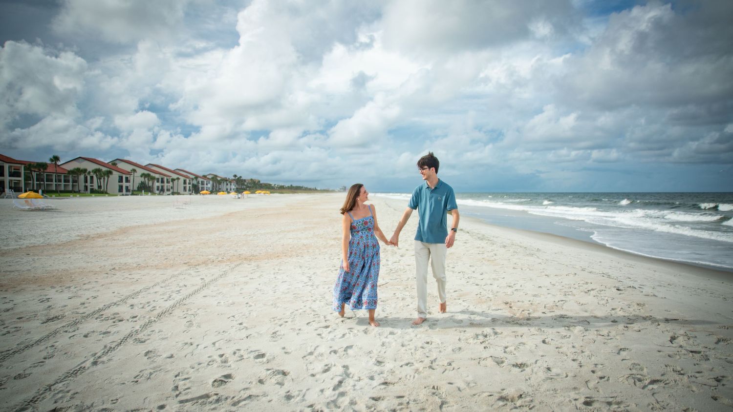 A series of panoramic beach scenes showing sandy shores, ocean waves, and cloudy skies along the coastline.