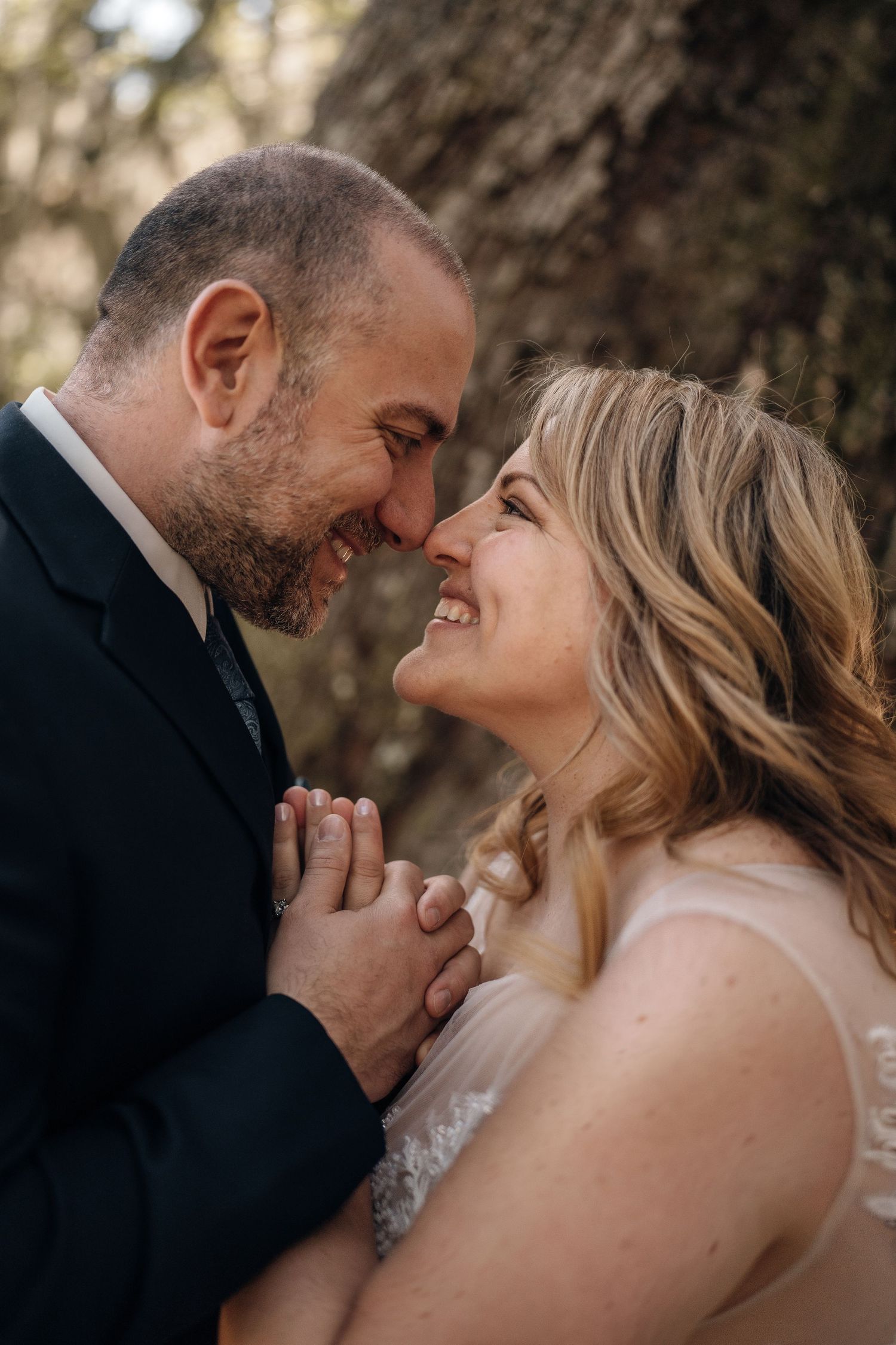 Close-up wedding portraits showing intimate moments between the couple.
