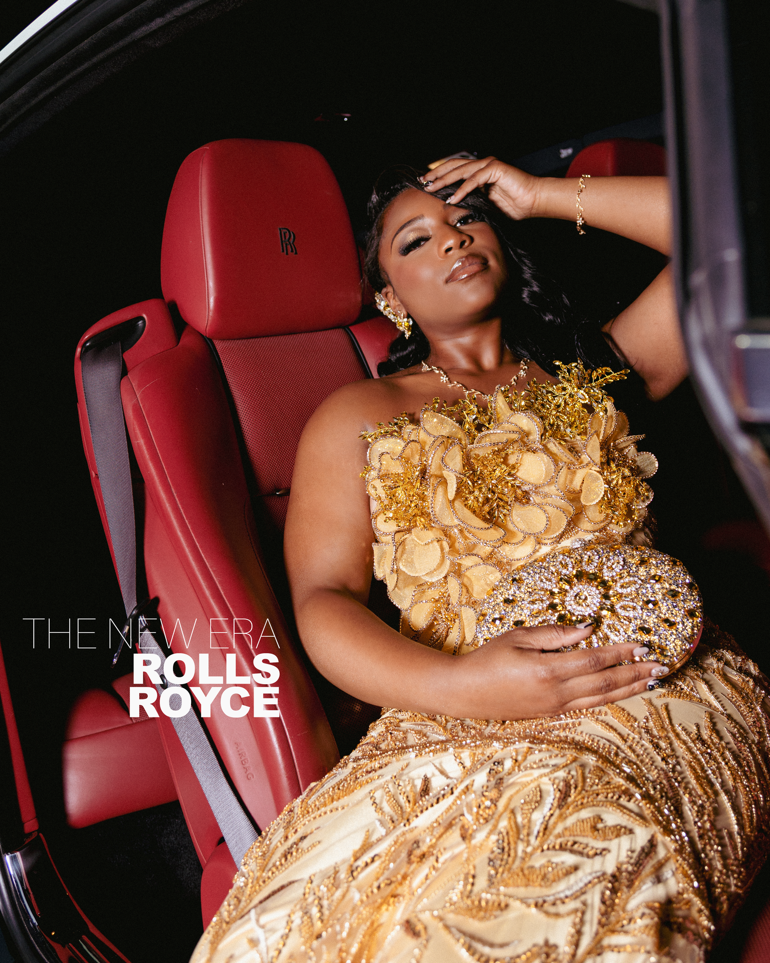 Woman in gold gown poses in Rolls Royce luxury car interior for The New Era campaign.