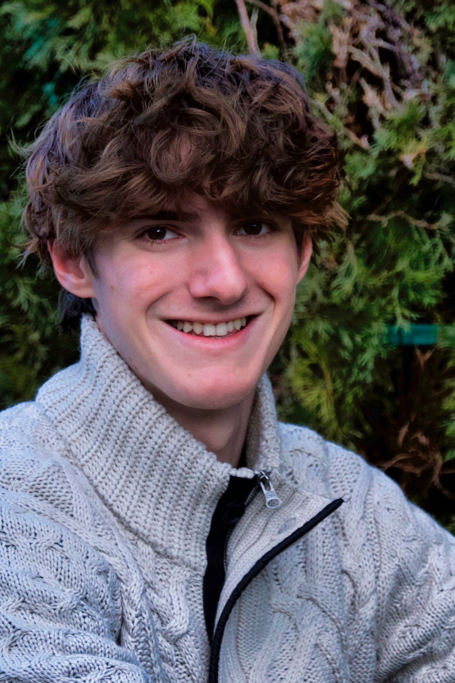 Male with curly hair smiling Fraser Valley