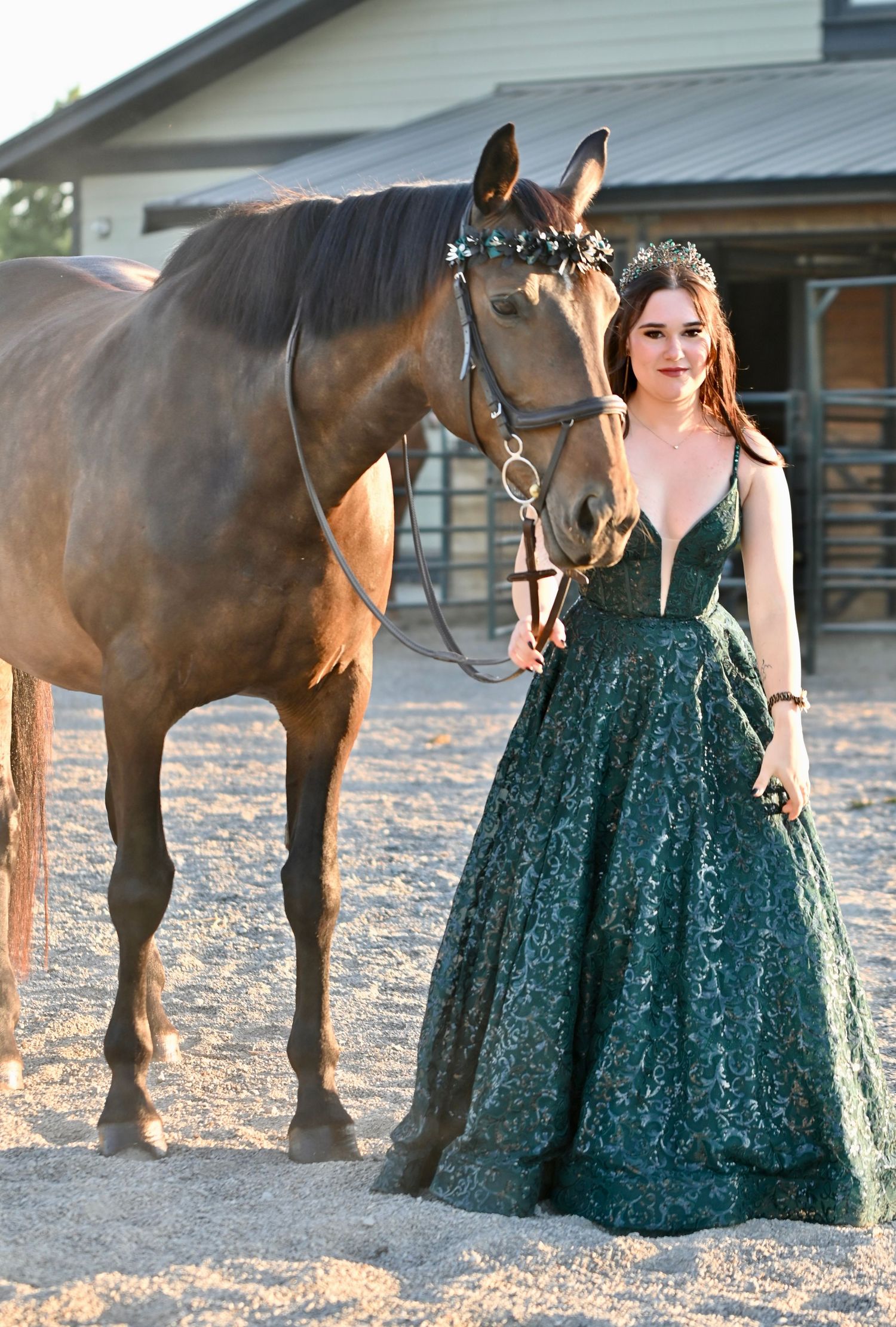 Female in graduation gown leading horse, sun, equine, Fraser Valley