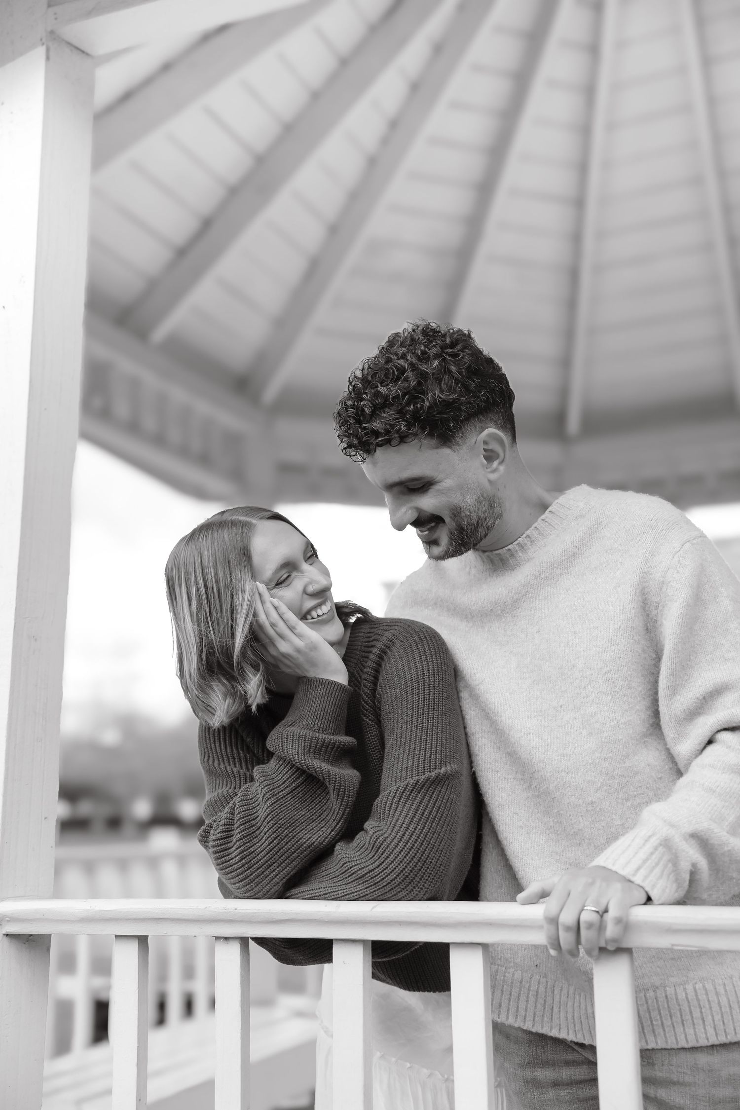 Couple Smiling at Each Other Under Pavilion in Louisiana