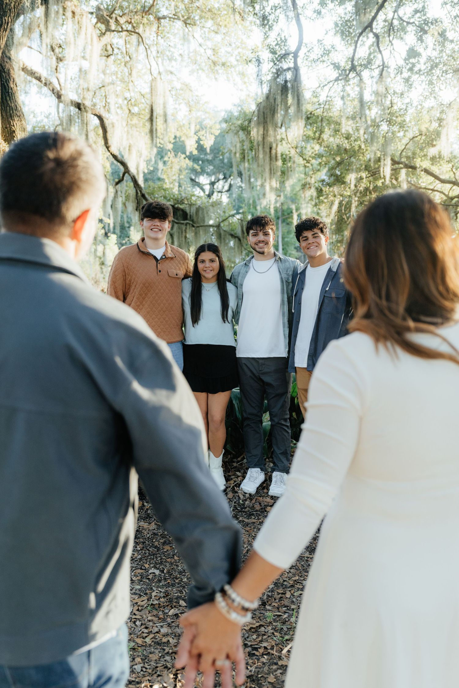 Parents and Family Holding Hands Smiling in New Orleans