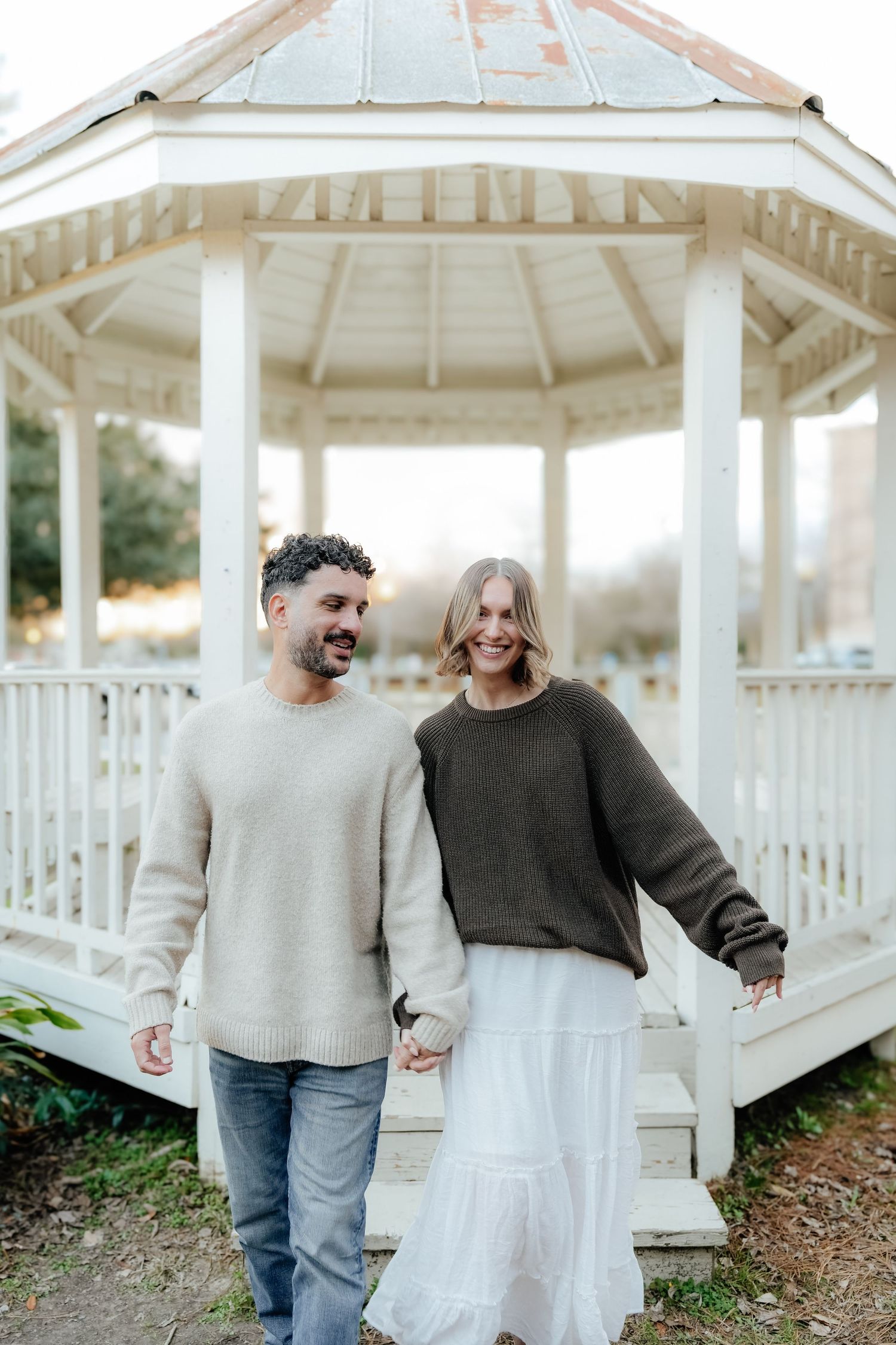 Couple Smiling at Each Other Under Pavilion in Louisiana