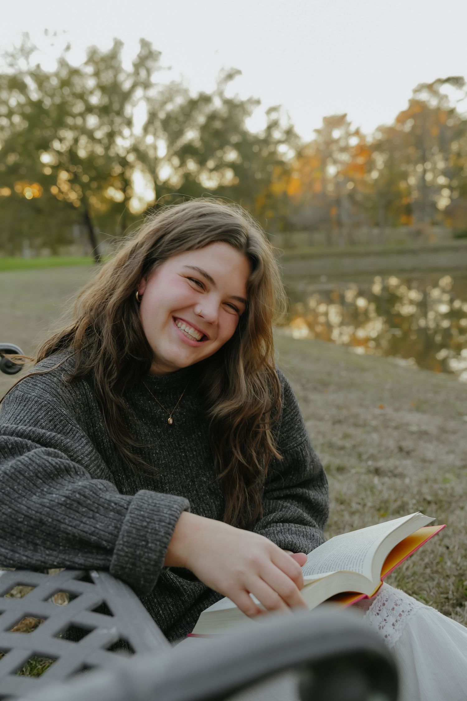 Portrait of Girl Reading a Book and Smiling in Louisiana